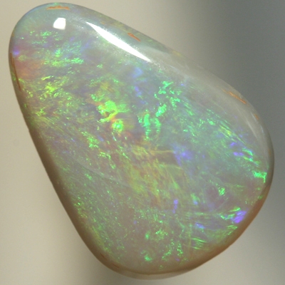 SOLID SEMI BLACK OPAL Greens and a touch of orange sparkle constantly